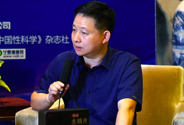 麦选诚